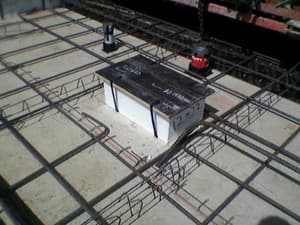 What is the most cost-effective concrete block-out material?